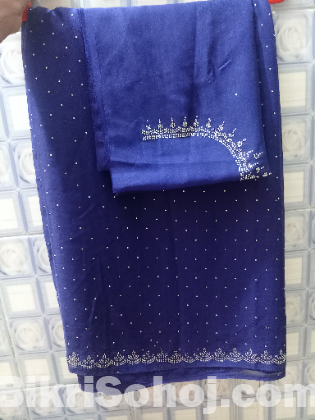 Blue full stonework saree with unstiched blows